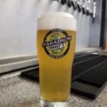 picture of neighbor girl tripel from paradigm shift craft brewery poured on tap