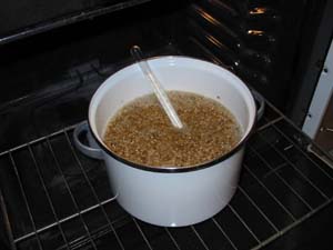 Partial mash kettle on an oven rack.