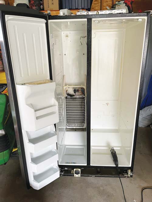 removing the guts of a side-by-side fridge